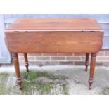 A 19th century mahogany Pembroke table, fitted single drawer, on turned column and quadruple splay