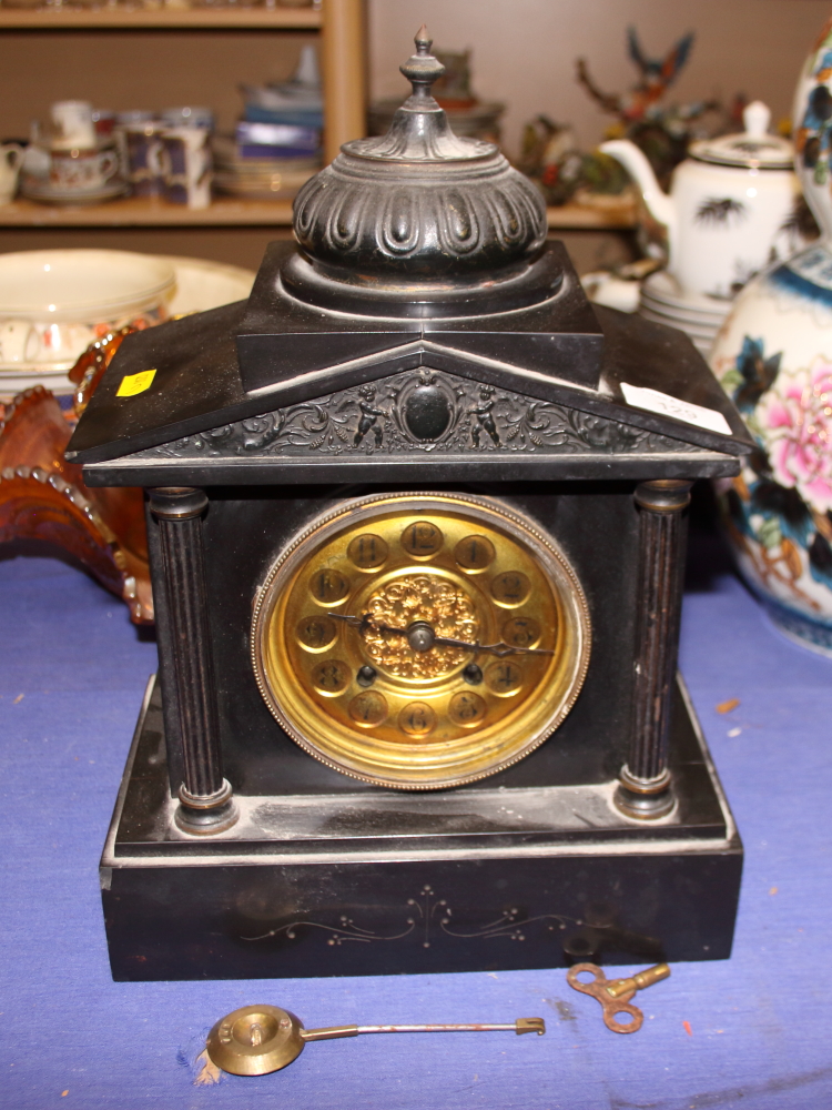 A 19th century slate mantel portico clock with gilt dial, 13 1/2" high