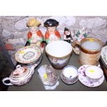 Two character jugs, a quantity of Chinese tea bowls, a relief decorated tankard, two Staffordshire