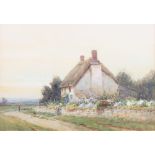L Goodwin: a pair of watercolour landscapes with cottages, 9" x 13 1/2", in gilt mounts and gilt