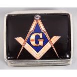 A white metal pill box with applied Masonic symbol mount, stamped sterling, 1 1/4" wide