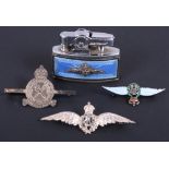 Three Royal Airforce brooches and a Ronson Royal Airforce enamelled cigarette lighter