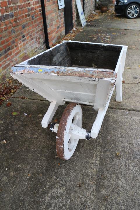 An early 20th century white painted wooden garden wheelbarrow, 62" long - Image 2 of 2