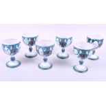 A set of six Aldermaston goblets, an Alan Caiger-Smith goblet and two Aldermaston coffee cups