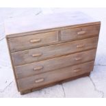 A walnut chest of two short and three long graduated drawers, on block base, 42 1/2" wide