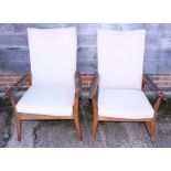 A 1950s Furpro walnut frame fireside rocking chair