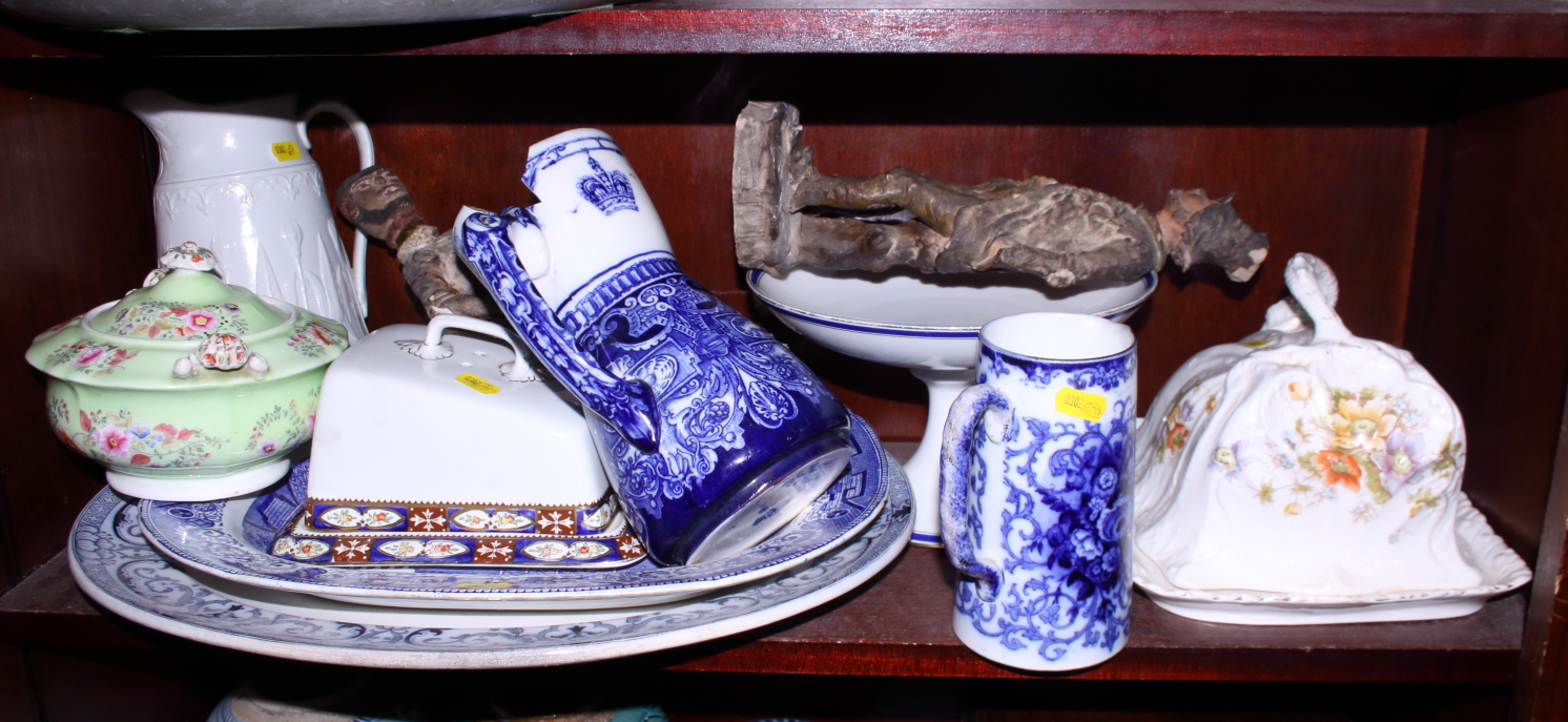 A "Willow" pattern blue and white platter, a Limoges cake stand, two cheese dishes, a Burslem