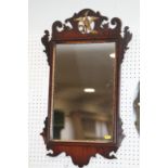 A mahogany framed wall mirror of early 18th century design with hoho bird crest, plate 17 1/2" x