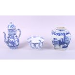 A Chinese blue and white square ginger jar, decorated figures in a garden, 5 1/2" high, a blue and