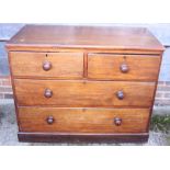 A walnut chest of two short and two long drawers, on block base, 42" wide