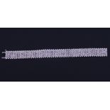 A mesh effect bracelet mounted chip diamonds, set in white metal stamped 925, 7 1/2" long closed