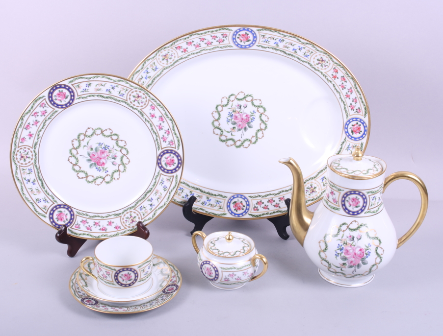 A Haviland Limoges "Louveciennes" pattern part combination service with floral and gilt