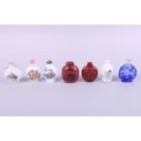Seven Chinese snuff bottles, various, each 2 1/2" high approx