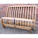 An oak double bed frame