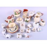 A collection of Torquay/Mottoware pottery and a selection of crested china, various