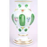 A Bohemian overlaid and cut glass baluster vase with hand-painted gilt and floral decoration, 8 1/4"