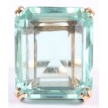 An emerald cut aquamarine ring, thirty-seven carats approx, in yellow metal mount, stamped 14ct