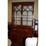 A 19th century mahogany satinwood and ebony banded secretaire bookcase enclosed two gothic lattice