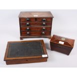 A late 19th century / early 20th century sarcophagus tea caddy, 7 1/2" wide, a miniature mahogany