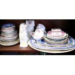 A pair of Staffordshire dogs, and an assortment of willow pattern platters, mixed plates and other