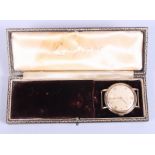 A 1940s 9ct gold cased Longines wristwatch with manual wind mechanical movement, champagne dial with