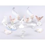 Two Royal Copenhagen model chicks, two Lladro cockerels, three Lladro swans and three other birds