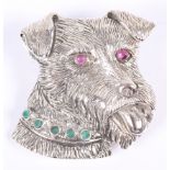 A white metal brooch, in the form of a dog with gem set eyes and collar, stamped sterling