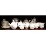 A Royal Worcester "Roanoke" pattern bone china tea service for twelve, including three teapots and a