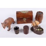 A lignum vitae bucket vesta holder with brass mounts, 2 1/2" high, a walnut box, a carved bear and