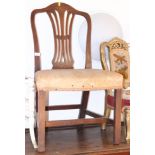 A Georgian provincial mahogany standard dining chair with pierced splat back and stuffed over seats,