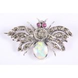 A white metal, marcasite and opal brooch, formed as a bee with gem set eyes, stamped 925