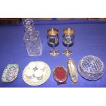 A cut glass decanter and stopper, a cut glass rose bowl, a silver mounted clothes brush, an