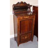 A late Victorian rosewood and inlaid music cabinet with mirrored ledge back over half glazed