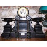 A 19th century slate and marble clock garniture with white enamel dial and Roman numerals with