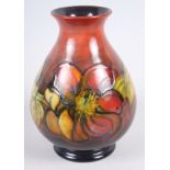 A Moorcroft "Dahlia" pattern squat vase, 7" high