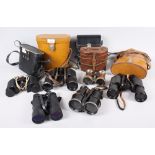 Six pairs of early 20th century binoculars, including Kershaw Monarch twelve, 12x40