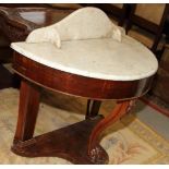 A late 19th century mahogany semicircular marble top washstand, 35 1/2" wide