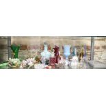 A collection of coloured glass figures, perfume bottles, glass and hardstone fruit, etc
