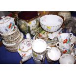 A musical jug, "The Eton Boating Song", 9 1/2" high, a Spode part teaset, collectors plates, a