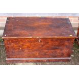 A polished as walnut pine blanket box with candle drawer, on block base, 33" wide