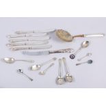 Five silver handled butter knives, a silver handled cheese knife and various other flatware