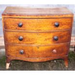A 19th century mahogany and banded chest of three graduated drawers with knob handles, on splayed