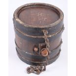 An oak costrel barrel with black metal banding, 8 1/2" high