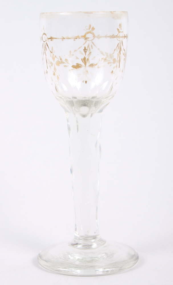 A mid 18th century cordial glass with gilt decorated bowl and faceted stem 5" high (gilding rubbed)