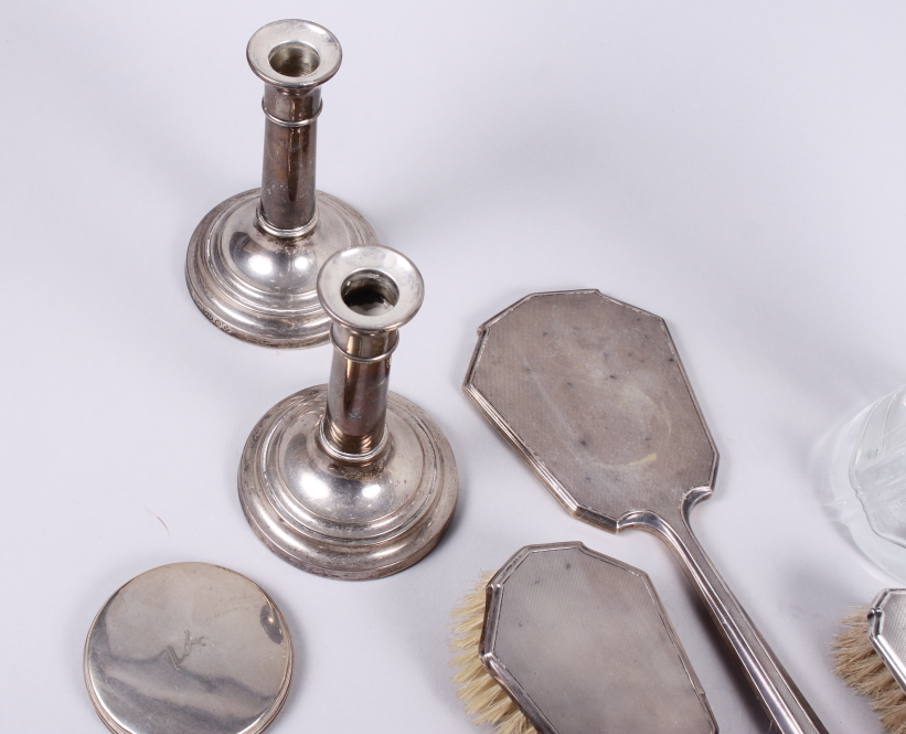 A pair of cylindrical silver candlesticks, two silver inkwells, a silver backed dressing table set - Image 3 of 5