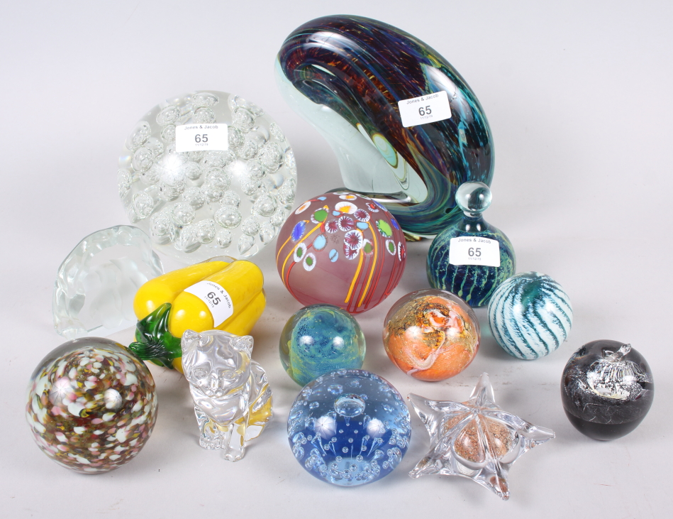A clear glass paperweight, 5 1/2" high, a Maltese paperweight, and other glass