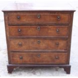 A Georgian fruitwood chest of four long graduated drawers with ring handles, on bracket feet, 38"