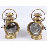 A pair of early 20th century brass car lamps, manufactured by J & R Oldfield, 10 1/2" high