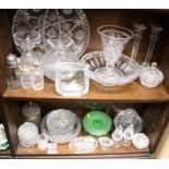 A collection of cut glass, including a lamp, a vase, bowls, plates, etc