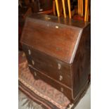 A mahogany corner unit, 21" wide, a nest of three yew tables, 21" wide, an oak bureau, 13" wide x 13